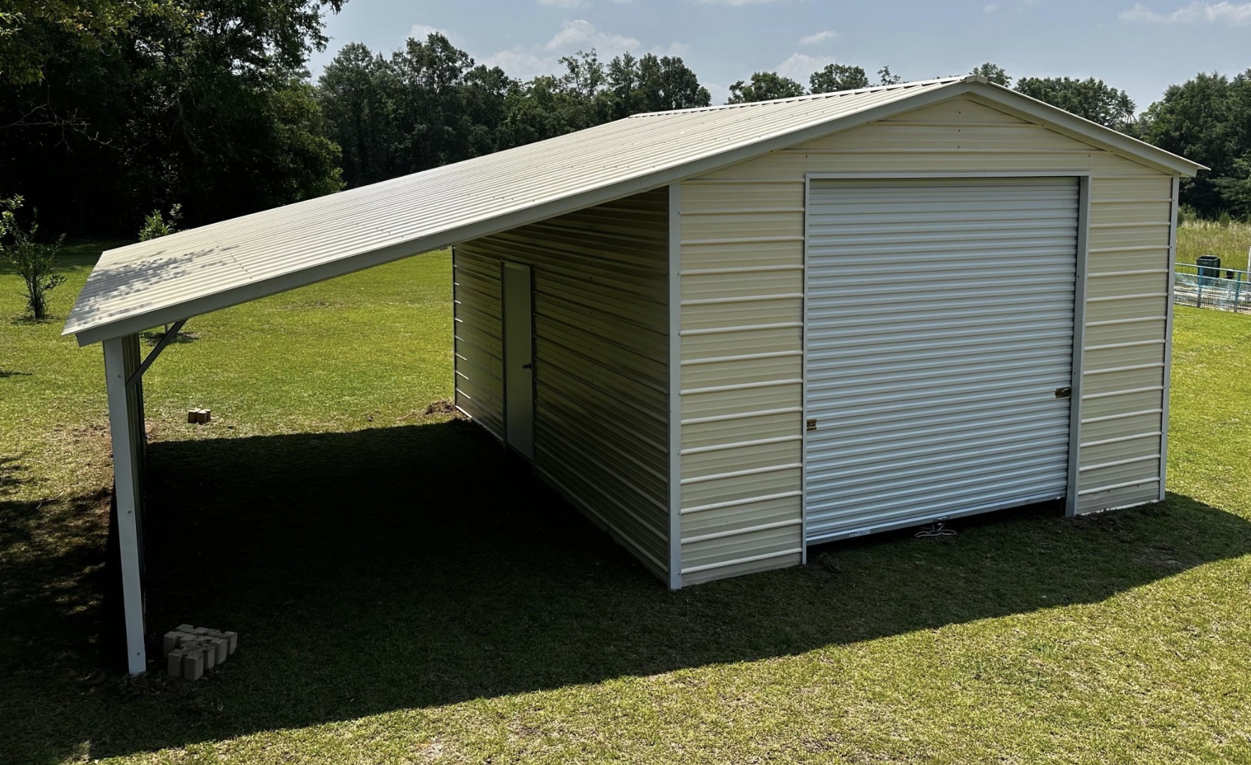 Steel garage with lean-to